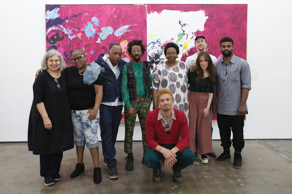 (L-R) Amy Sillman, Brenna Youngblood, Henry Taylor, Torey Thornton, D’Metrius John Rice, Jamillah James, Ulrich Wulff, Jamian Juliano-Villani, and Kevin Beasley at the opening reception for ‘A Shape That Stands Up’ at Art + Practice. 19 March 2016. Photo by Natalie Hon.