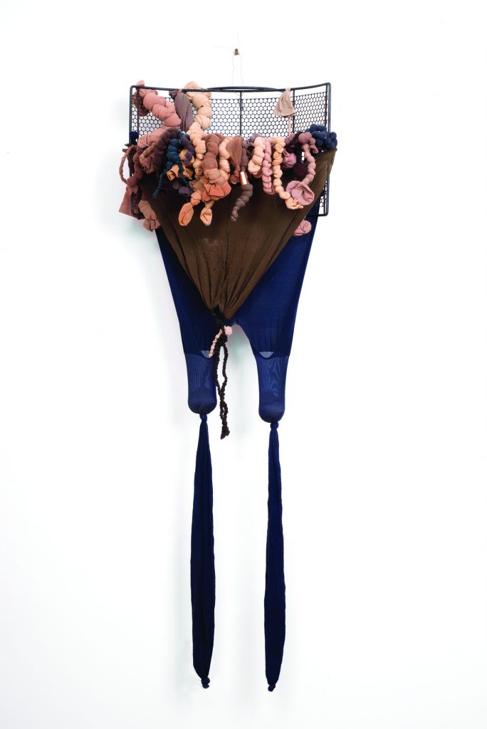 Senga Nengudi RSVP Reverie A, 2011 Nylon pantyhose, sand, mesh screen Craft and Folk Art Museum (CAFAM). Collection of Lauren and AC Hudgins